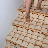 Toast slices arranged into a wall grid.